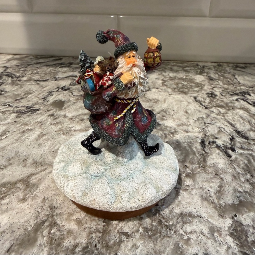 Lang Candle Topper Santa’s Coat of Colors Holiday Christmas‎